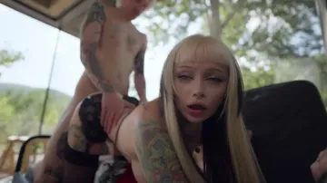 Tattooed Blonde in Stockings on Patio Couch
