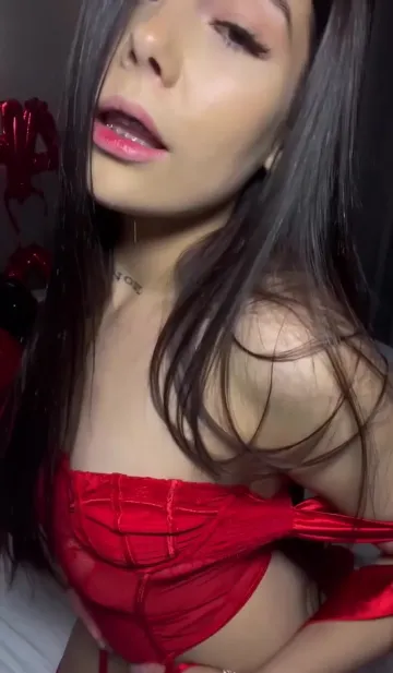 Brunette Poses in Red Lace by Balloons