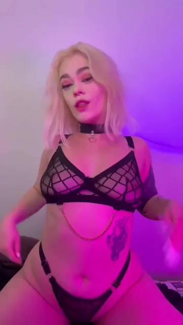Short Haired Blonde Dances in Black Lace