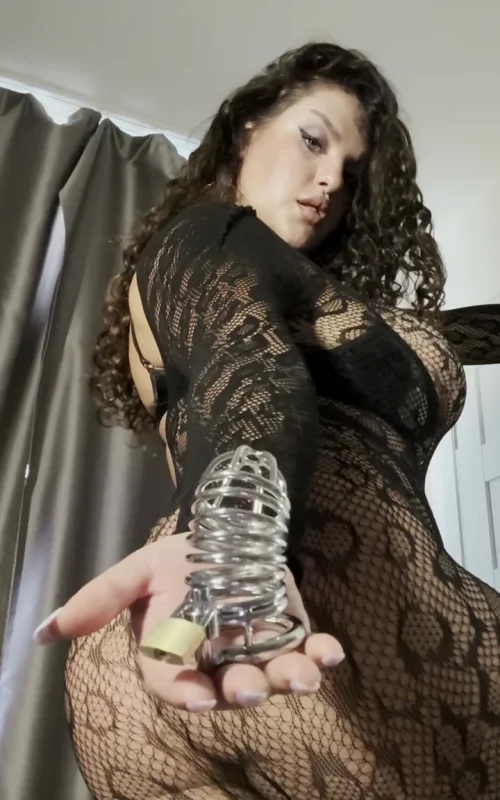 Curly-Haired Brunette Poses in a Sheer Patterned Bodysuit